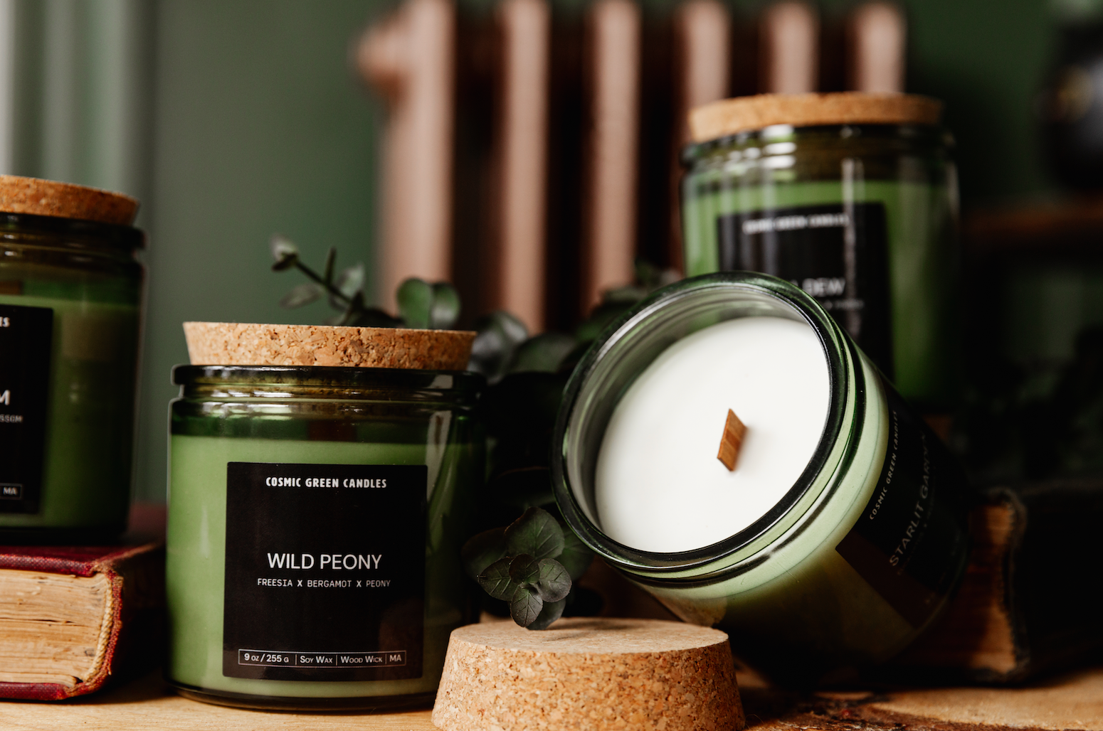 A set of candles from the Lush Meadows Collection, inspired by nature, with fresh, earthy scents and eco-friendly packaging.